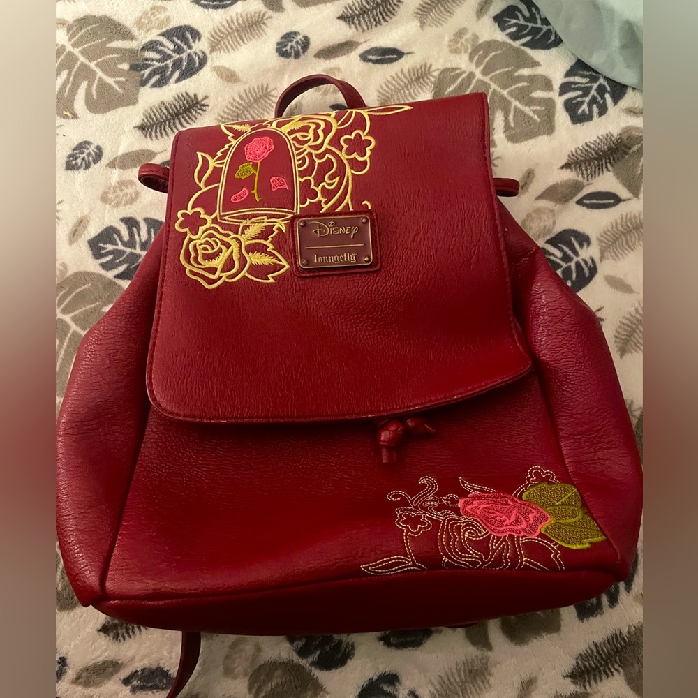 rare discontinued beauty and the beast lounge fly backpack